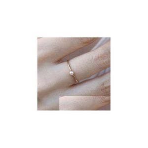 Bagues De bande Bague pour femmes délicate Mini perle mince anneaux minimaliste Style de base lumière jaune or couleur bijoux de mode Kbr010 Drop De Ot7B2