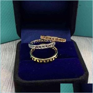 Bandringen verkopen Tiffy Home Romeinse ring 925 Sterling Sier Plated 18K goud smalle versie gladde holle rooster dubbele T-hand Jewe221U