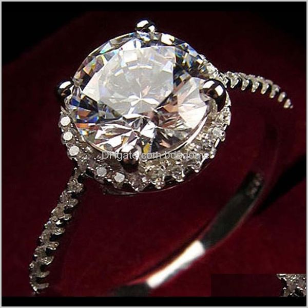 Anillos de banda Propuesta de Sterling Sier 1.2 Karat Incrustado Zircon Anillo de diamantes artificiales Joyas para mujer Entrega de gota 2021 CNYWB