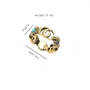 Bandringen Topkwaliteit 18K gouden plaat Letter voor heren Dames Modeontwerper Letters Turkoois kristal Metaal Daisy Ring Sieraden Eén Dhztw