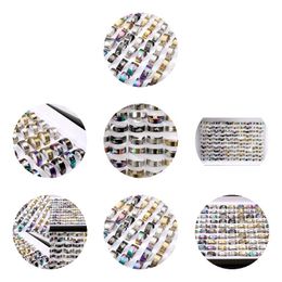 Anneaux de bande Wholesae 100pcs / lot en acier inoxydable Spin Band anneaux rotatifs motifs de mix imprimés laser Mticolor Mticolor Fashion Jewelry Spinner P DHFM2