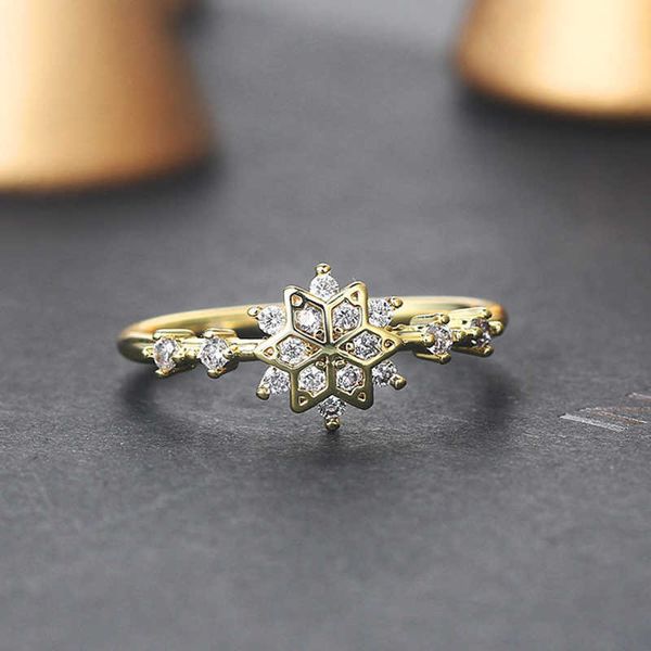 Anillos de banda ZHOUYANG, anillos de copo de nieve para mujer, anillo de boda de Color dorado claro de circón bonito coreano, joyería al por mayor, regalo de Navidad KCR093