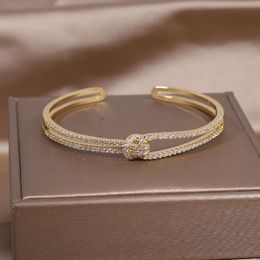 Bracelet 14K véritable placage d'or exquis AAA luxe plein zircon noeud bracelet femmes élégantes fête de mariage ouverture réglable 230508