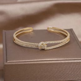 Brazalete 14K chapado en oro real exquisito AAA lujo pulsera de nudo de circón completo elegante fiesta de boda de mujer apertura ajustable 231021