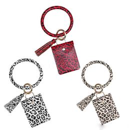 Brazalete Pulsera Bolsa de tarjeta Monedero Llavero Pulsera Llavero Leopardo Bolso Pulsera Titular de la tarjeta de crédito con borla Favor de fiesta Da746