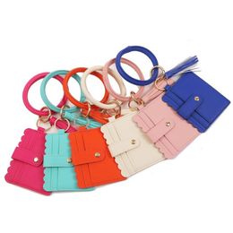 Brazalete Pulsera Bolsas de almacenamiento de tarjetas Bolsa Monedero Llavero Muñequera Llavero Bolso de leopardo Titular de la tarjeta de crédito de cuero con borla 39 estilo SN4657