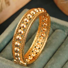 Bangle koperen plating gouden balontwerp handbanden met holle lijnen luxe Arabische bruiloft sieraden zijde open manchetarmbanden