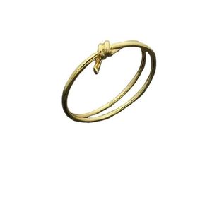 Braceneur de créateur de bracelet gold dames en acier inoxydable nœud lisse couple mode bijoux de luxe