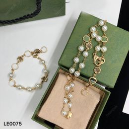 Brazalete de diseñador Pulseras para mujeres Hombres Conjunto de joyas de lujo Pendiente de perlas Cristal 18K Collar chapado en oro Tigre Colgante Caja de eslabones de cadena