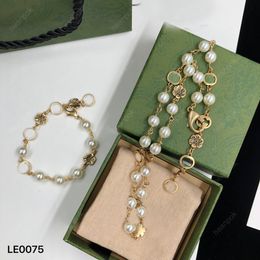 Brazalete Pulseras de diseño para mujeres Hombres Conjunto de joyas de lujo Pendiente de perlas Cristal Collar chapado en oro de 18 quilates Caja de eslabones de cadena colgante de tigre