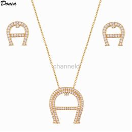 Bangle Donia bijoux mode nouveau luxe micro-incrusté AAA boucles d'oreilles avec liste de zircone collier boucle d'oreille ensemble dames pendentifbijoux 240319