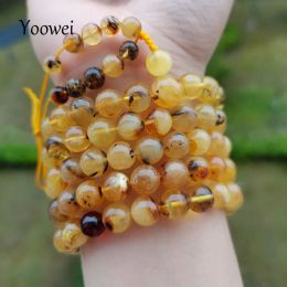 Bracelets Yoowei 6mm9mm Bracelet en ambre naturel véritable 108 perles de plantes Mala méditation collier bouddhiste nouveau paysage Ambar bijoux cadeau