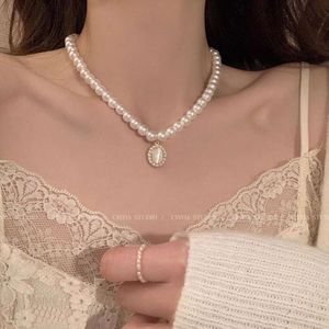 Collier de perles baroques pour femmes, chaîne en os avec serrure en pierre oeil de chat