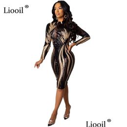 Robes décontractées de base Robes décontractées Liooil Sequin Y Mesh Sheer Moulante Robe Midi 2021 Automne Hiver Manches Longues Voir À Travers Serré Dh1Og