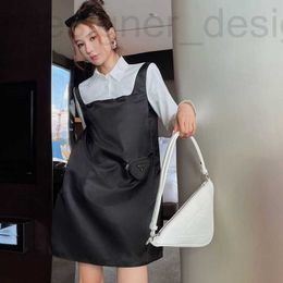 Vestidos casuais básicos designer 2023 outono camisa branca vestido médio comprimento falso conjunto de duas peças cintura alta a-line pequeno desgaste feminino preto kg0a