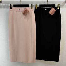 Basic Casual Dresses Designer 2024 Early Spring Nieuwe High Order and Definition Miu Girl's Age vermindert veelzijdige letter Jacquard Taille Slim Break Helft Rok 5ppi
