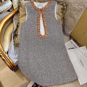 Basic Casual Jurken designermerk Miu-stijl grijze mouwloze jurk met diamanten studs en een designgevoel, grove tweed losse A-lijn rok, nieuwe herfst tanktoprok 80D1