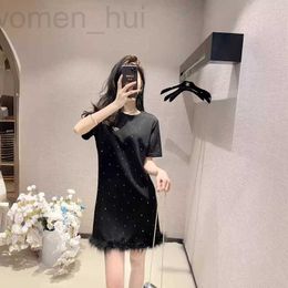 Robes décontractées de base Designer Triangle classique Full Sky Star Heavy Industry Hot Rouled Diamond Hand Cous cousu Ostrich Feather Tassel Robe Slinmming Mid Jirt LKK7