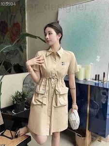 Basic Casual Dresses Designer Miu Family Dress 2023 Zomer Nieuwe Franse Celebrity Double Pocket Drawtring Taille A-Line Midlength EEX6 QLYX