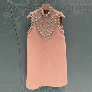 Basic casual jurken ontwerper Miu Miao Chunxia zware industrie diamant inbedding jurk luxe mouwloze ronde nekjurk, elegante en A-lijn rok voor dames isza