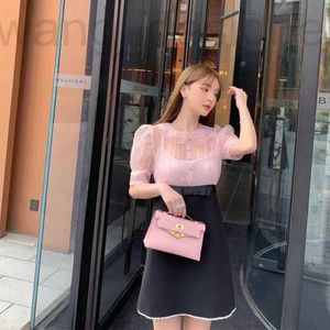 Basic casual jurken ontwerper Miu's roze eugenborduurde poppenhals bubbelmouwen jurk prinses korte rok live dameskleding 9Z77