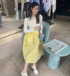 Basic casual jurken ontwerper Shenzhen Nanyou high -end Miu Home lente/zomertijdperk reduceren landelijke stijl zijta taille Ontwerp geel rooster pure katoenen half rok 37J