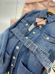 Basic casual jurken ontwerper Shenzhen Nanyou high -end Miu Home Herfst en winterblauw gewassen gepersonaliseerde denimjurk met diamanten riem OKR4