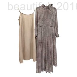 Robes décontractées de base Designer Spring and Automne Robe avec doublure de cintre, demi-cou haut, taille, jupe de longueur de genou imprimée à la mode KST2