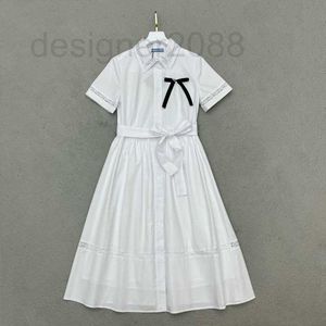Designer de robes décontractées de base Summer New Commuter Style Simple et à la mode Lace Patch Triangle Bow Shirt Dress XJOU