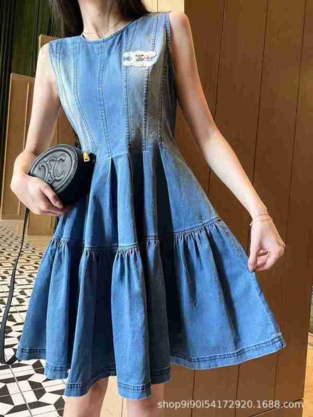 Designer de robes décontractées de base Summer New Washed Denim Fluffy Dress Korean Girls 'Style Jupe enveloppée à la taille avec coupe 3D 4YH5
