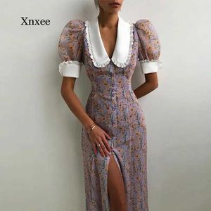 Basic Casual Dresses Summer Ladies Elegante knop Slit Lange rok V-hals Floral Fashion Retro Puff Sleeve Dress Sexy Print Beach Jurk 240419