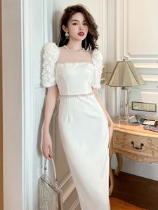 Femmes de base décontractées 2024 Robes d'été Nouvelle robe formelle douce célébrité perle blanche longue robe transparente fleurs divisé slim robe féminin de bal de bal Vestido 2024
