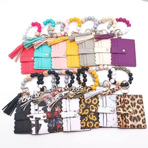 Porte-clés portefeuille Portable en Silicone, perles, pompon, sac à cartes, pendentif, Bracelet