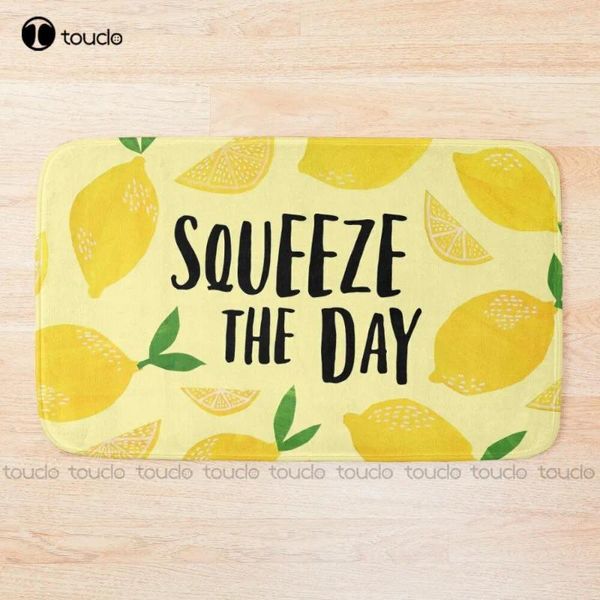 Tapis de bain presser le jour des citrons de tapis blanc