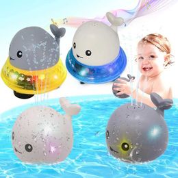 Toys de bain Spray à eau jouet baleine baleine en forme de lumière LED Spring Strip Light Music Light Automatic Senting jouet baby shower jouet D240522