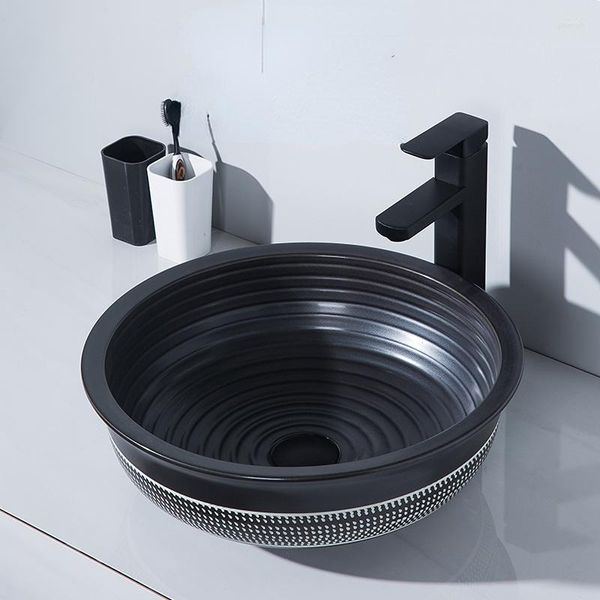 Grifos de lavabo de baño, lavabo de mesa negro mate, lavado artístico para el hogar, plato de mano creativo individual, lavabo de cerámica entre plataformas