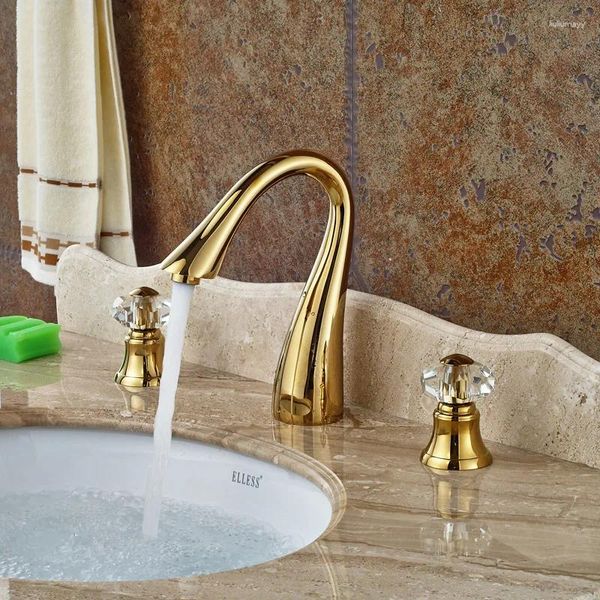 Grifos de lavabo de baño Grifo de lavabo dorado de doble manija Montado en cubierta Grifos mezcladores de bañera generalizados 3 agujeros Frío