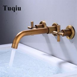 Grifos de lavabo de baño Grifo de lavabo Tuqiu Grifo mezclador de doble manija montado en la pared Frío en la pared Bronce antiguo Latón total