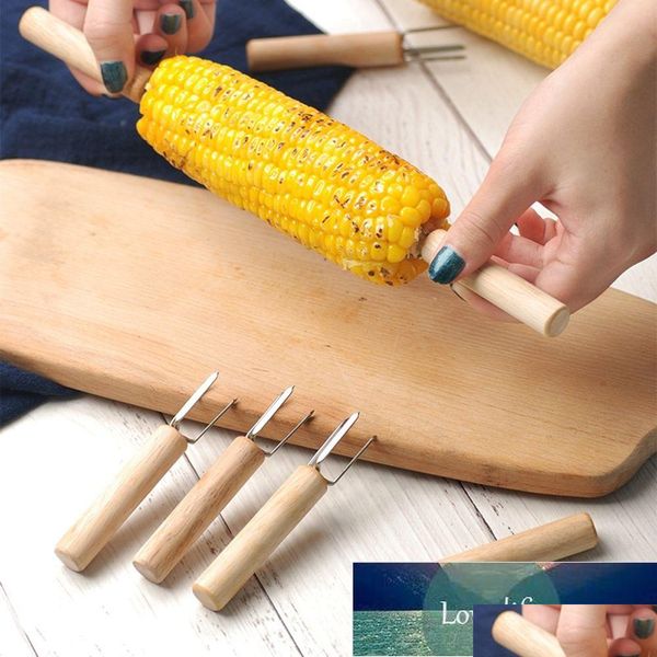 Accessoires d'outils de barbecue 1 pcs porte-maïs en acier inoxydable sur les fourchettes de fruits en épi avec manche en bois pour la cuisine à la maison et le facteur de broche Dhwop