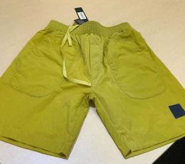 Spiaggia 2023 Pantaloncini estivi Pantaloni corti da uomo Moda da corsa Sciolto Processo di lavaggio ad asciugatura rapida di tessuto puro Trendy Casual Hip-hop Ins Stones Motion current 29ess