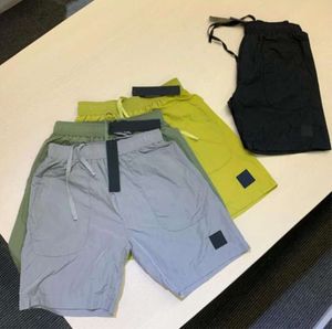 Plage 2023 shorts d'été pour hommes pantalons courts courir le processus de lavage à sec rapide du tissu pur à la mode.