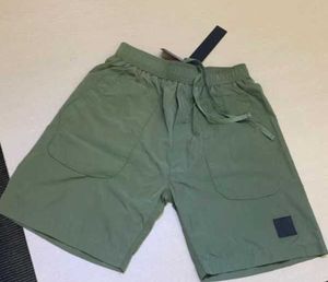 Beach 2023 Shorts d'été pour hommes Pantalons courts Mode Running Lâche Processus de lavage à séchage rapide de tissu pur Tendance Casual Hip-hop Ins Stones Island Motion actuel 60ess