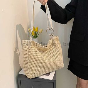 Sacs de plage Sac de seau 2022 Été Nouveau sac à main simples pour femmes Vacation de plage de plage Sac paille tissée Tide Caitlin_Fashion_Bags