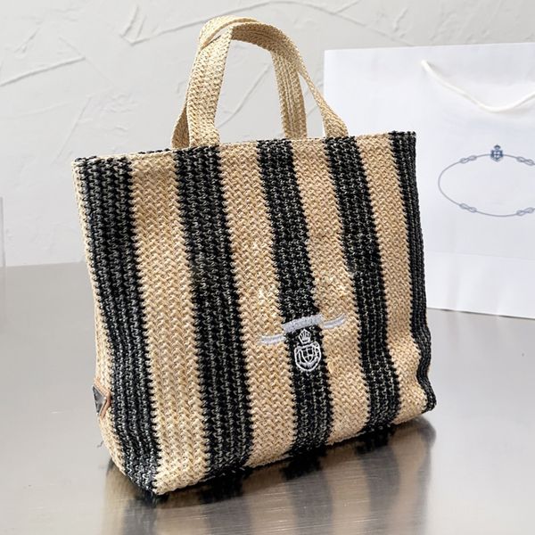 Bolsos de playa Moda Lafite Grass Bolsos Letras bordadas clásicas Hollow Out Pure Hand Woven Bagss Paja Compras Vacaciones Verano Monederos tejidos Bolsillo con cremallera