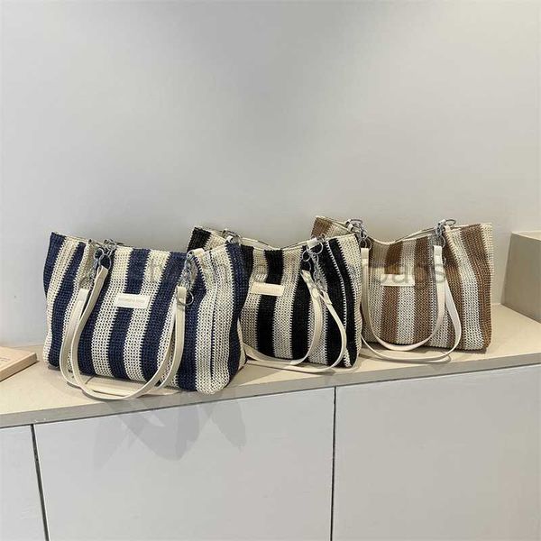 Bolsas de playa Bolsa de gran capacidad para mujeres 2023 Nuevo nicho de verano Stripe Stripe Tote Simple Casual Versatil Shoulder Bag for WomenstylishDesignerbags