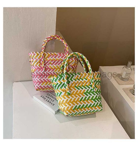 Sacs de plage Panier de légumes tissés en plastique sac à main le sac de plage de la sac à main 2023 Nouvelle mode d'été Sac de seau à tas