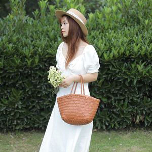 Sacs de plage Le même sac à main tissé en peau de vache de couche supérieure française pour les femmes ins sac de panier de légumes 230223