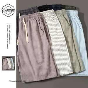 Pantalones cortos informales de playa para uso diario, pantalones de dos piezas con estampado de algodón y lino, versión coreana de pantalones de rayas verticales para hombre, pantalones cortos grandes