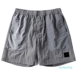 Pantalons de plage 2022 gonng marque shorts d'été mode pour hommes en cours d'exécution lâche processus de lavage à séchage rapide de tissu de coton pur