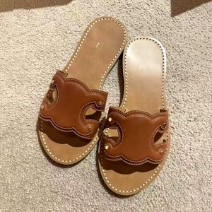 Luxe designer Sandale Dames Slippels Topkwaliteit Schoenmode Zomer Echte lederen sandaalhoens Sandelheren platte muildieren buitenglijden Casual schoenen Strand Sliders Lady Loafer